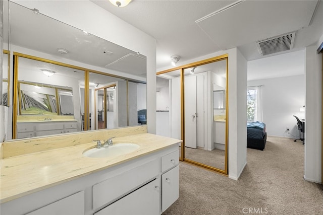 23515 Lyons Ave Unit 210, Valencia, CA 91355 - bathroom with vanity, ensuite bath, and carpet