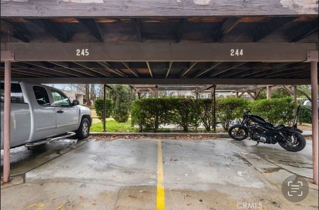 23515 Lyons Ave Unit 210, Valencia, CA 91355 - view of covered parking lot