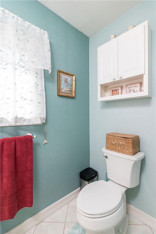 bathroom featuring tile patterned floors and toilet