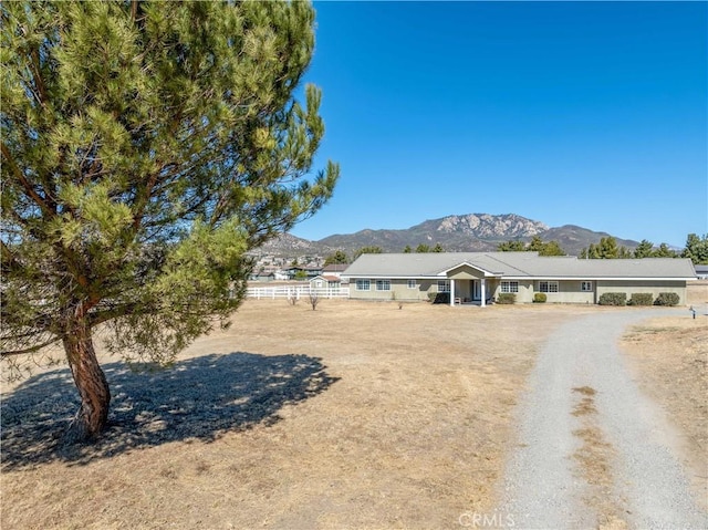 view of front of house featuring a mountain view