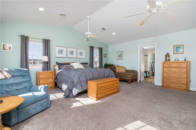 bedroom with light carpet, vaulted ceiling, and ceiling fan