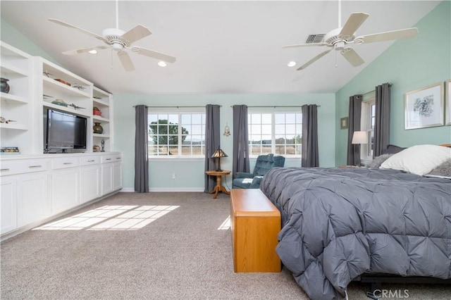 carpeted bedroom featuring vaulted ceiling and ceiling fan