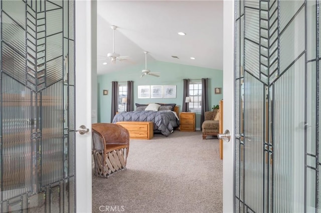 carpeted bedroom featuring vaulted ceiling