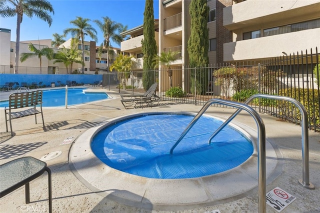 view of swimming pool featuring a patio