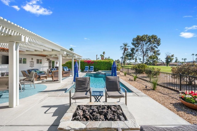 view of patio / terrace featuring a fenced in pool, a pergola, and an outdoor living space with a fire pit