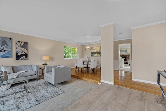 living room featuring crown molding and light wood-type flooring