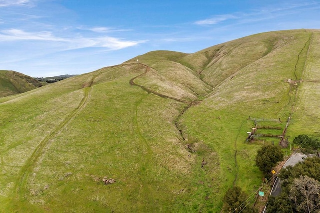 property view of mountains featuring a rural view