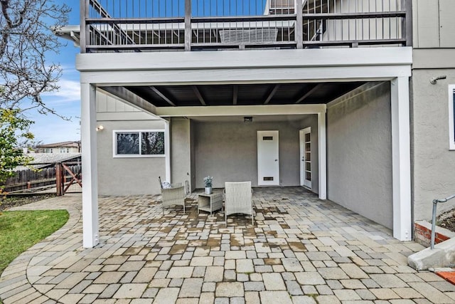 view of patio with a balcony