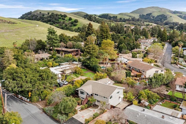 drone / aerial view featuring a mountain view