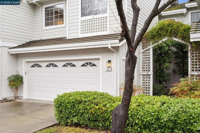 exterior space featuring a garage