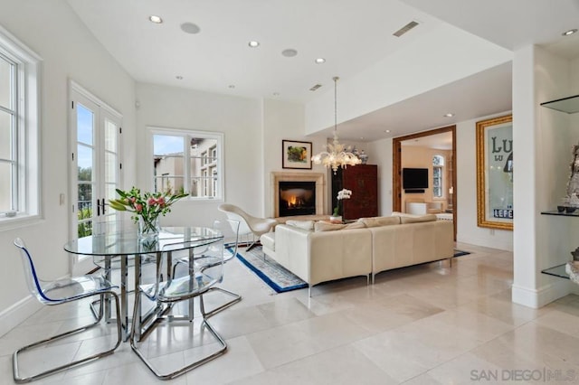 living room with a notable chandelier