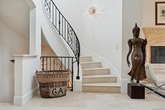 staircase with tile patterned flooring