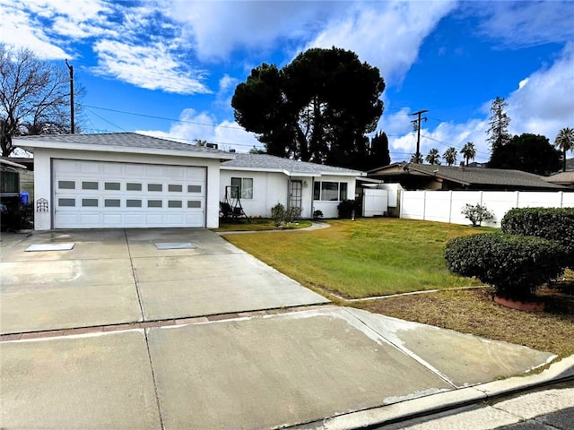 ranch-style house with a garage and a front yard