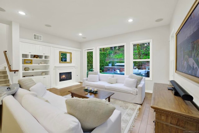 living room with light hardwood / wood-style floors