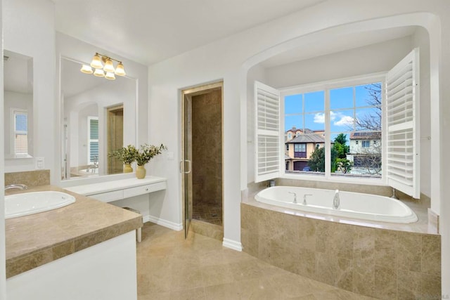 bathroom with independent shower and bath and vanity