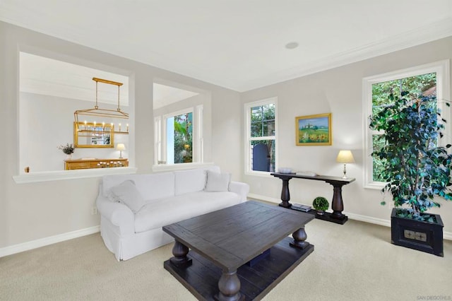 carpeted living room featuring ornamental molding