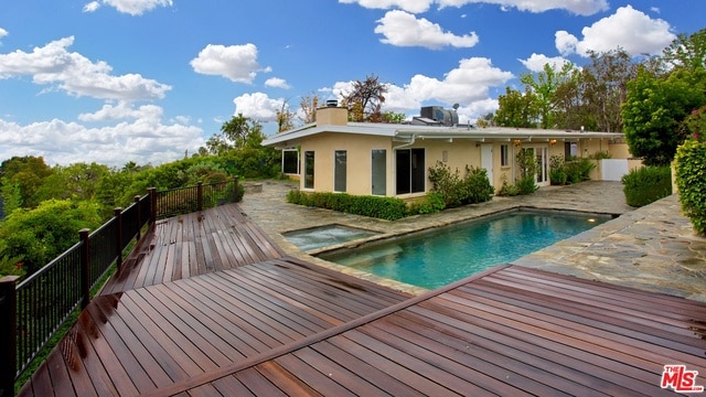 view of pool with a patio area