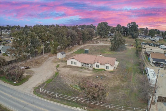 aerial view at dusk with a rural view