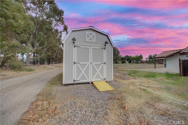 view of outdoor structure at dusk