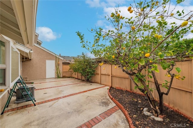 view of patio with central AC