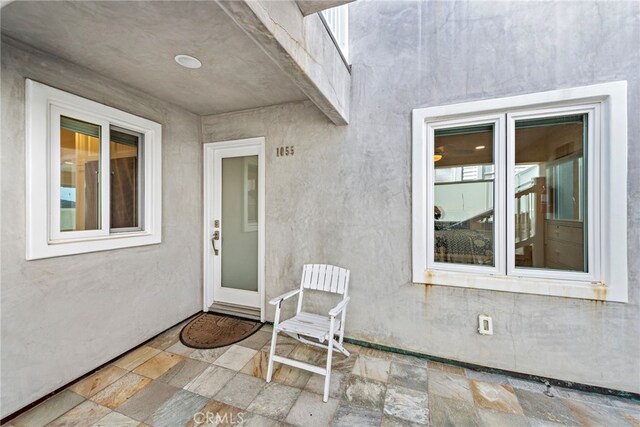 1051 Gaviota Dr, Laguna Beach, CA 92651 - property entrance with a patio and stucco siding