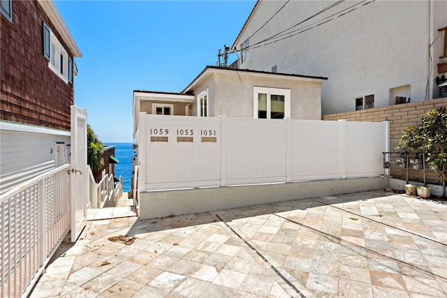 1051 Gaviota Dr, Laguna Beach, CA 92651 - view of home's exterior with stucco siding and a patio area