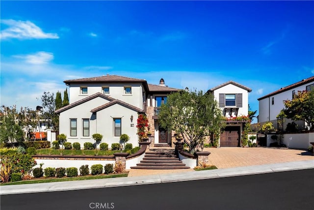 view of front of property with a garage