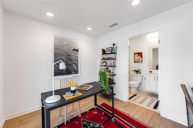 office with hardwood / wood-style floors