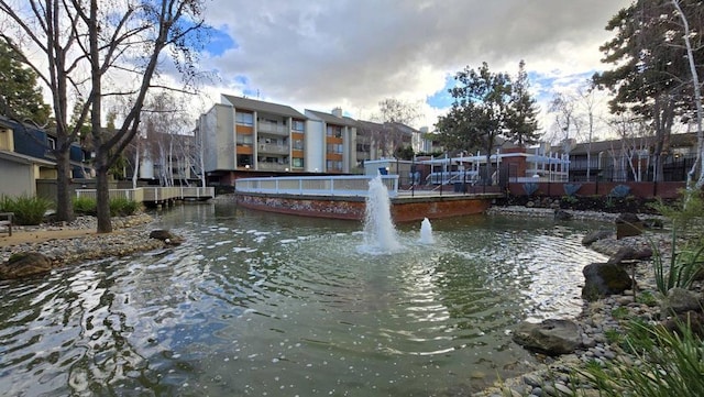 view of property's community with a water view