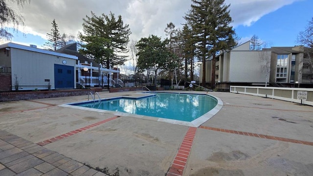 view of pool featuring a patio area