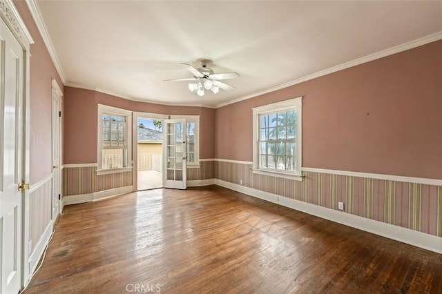 unfurnished room with french doors, ceiling fan, hardwood / wood-style flooring, and a wealth of natural light