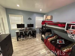 bedroom featuring light hardwood / wood-style flooring