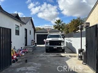 view of side of property featuring a garage