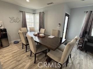 dining space featuring light hardwood / wood-style floors