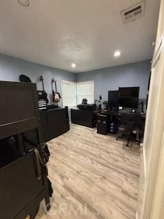 office space featuring wood-type flooring