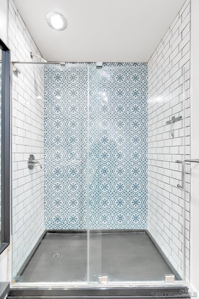 bathroom with an enclosed shower