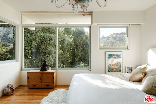 bedroom with light wood-type flooring