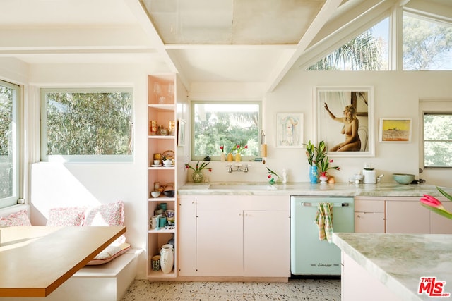 bar featuring dishwasher, sink, and white cabinets