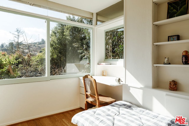 bedroom featuring hardwood / wood-style flooring