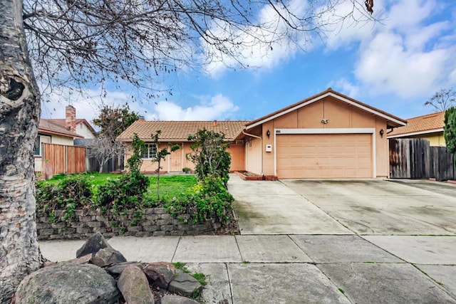 single story home featuring a garage