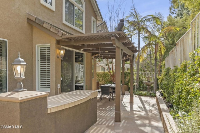 view of patio featuring a pergola