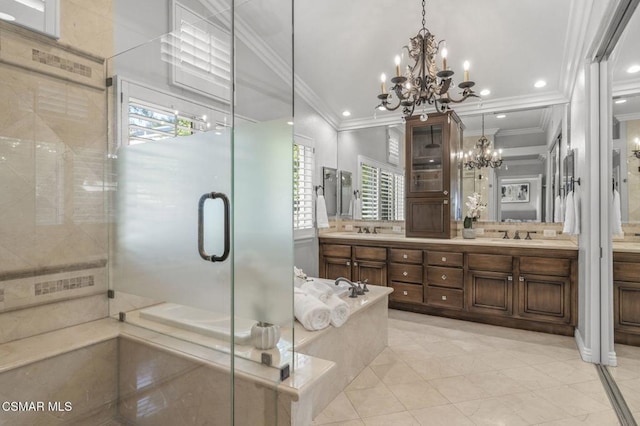 bathroom featuring vanity, a notable chandelier, crown molding, and a shower with door