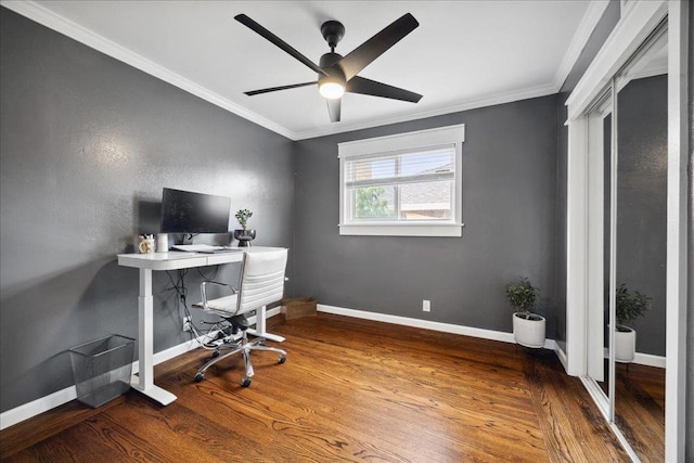 home office featuring wood-type flooring, ornamental molding, and ceiling fan