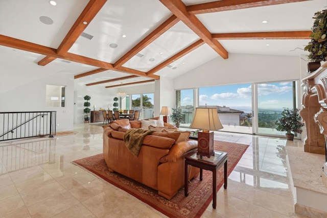 living room featuring beam ceiling and high vaulted ceiling