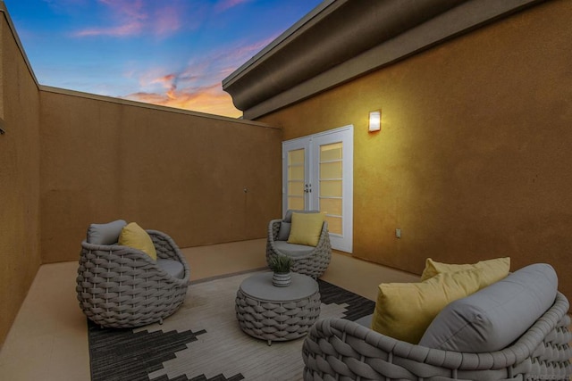 patio terrace at dusk with french doors