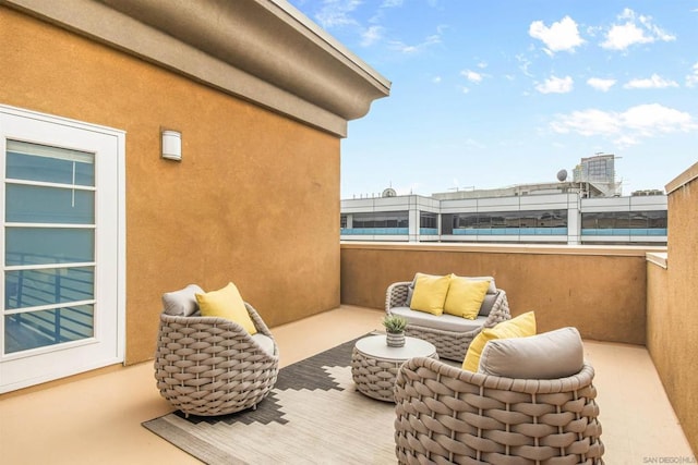 view of patio with a balcony