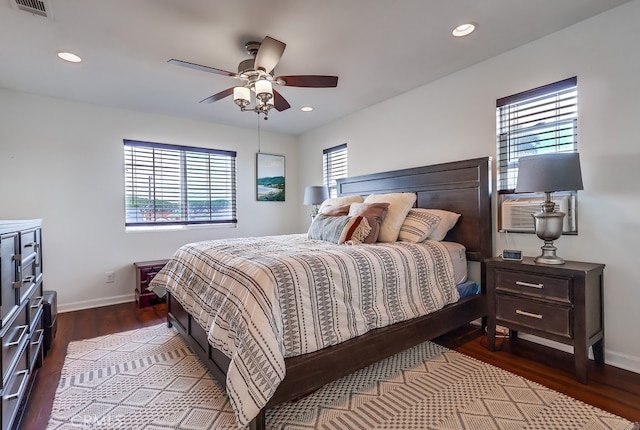 bedroom with ceiling fan and hardwood / wood-style floors