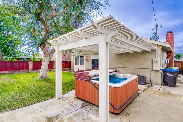 view of patio / terrace featuring a hot tub and a pergola