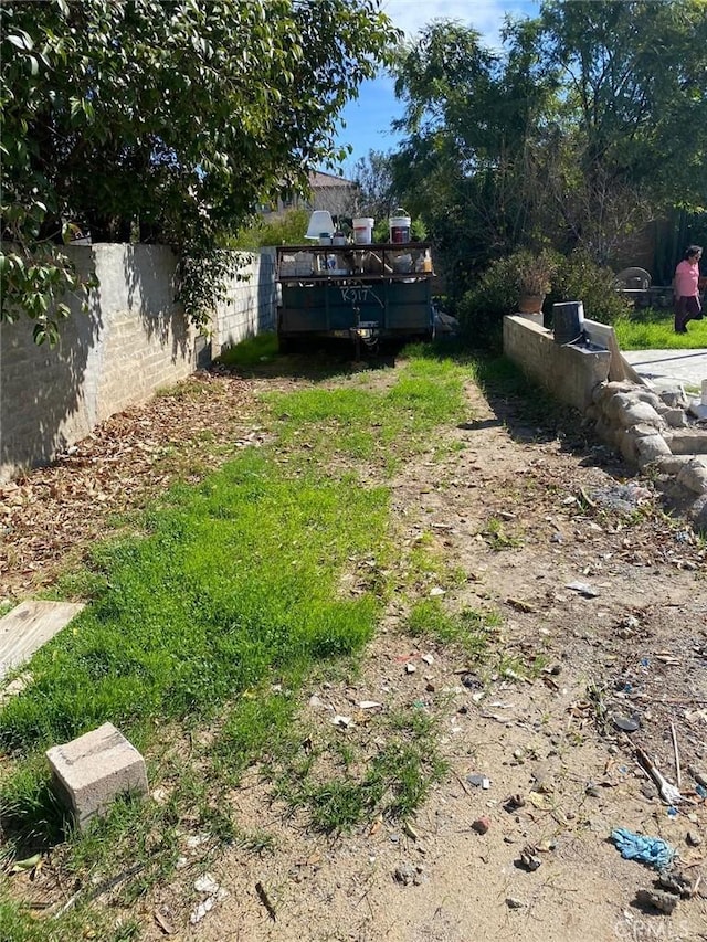 view of yard with fence