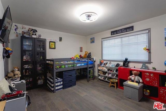 bedroom featuring dark hardwood / wood-style floors